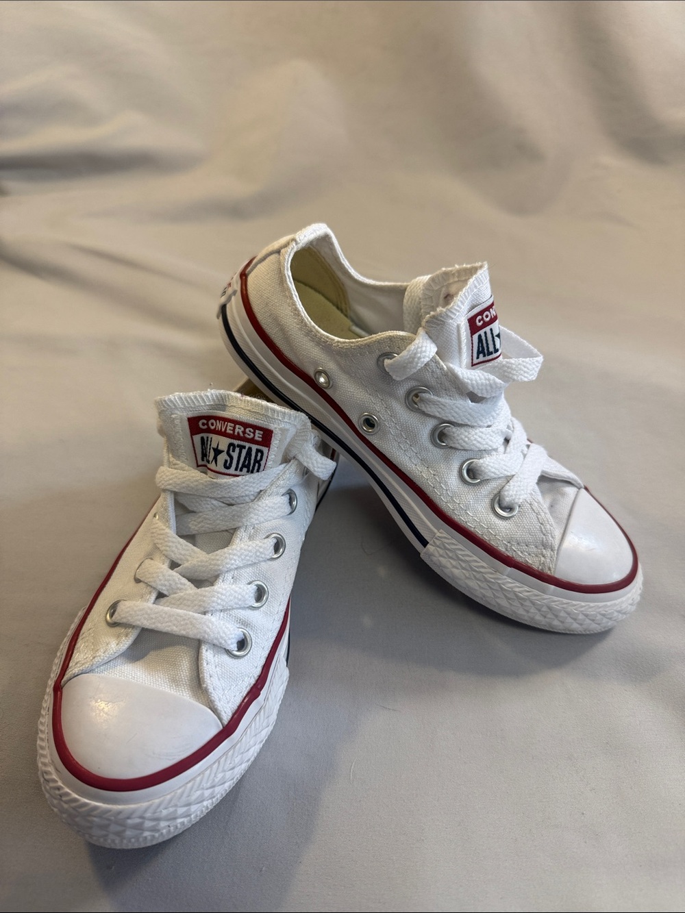 Converse White Low Top Sneakers with Red Trim